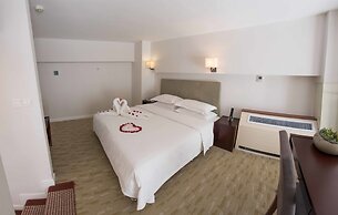 Yantai Meiya International Apt. Hotel