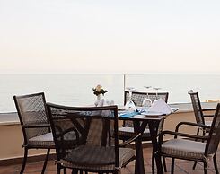 Giannoulis – Grand Bay Beach Resort - Adults Only