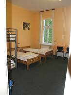 HappyGoLucky Hotel & Hostel