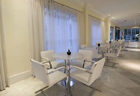 Rockefeller by Slaviero Hotéis