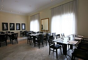 Rockefeller by Slaviero Hotéis