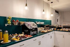 Ikonik Plaza Mercado