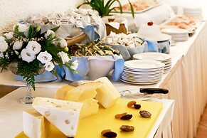 COLONNA GRAND HOTEL CAPO TESTA, a Colonna Luxury Beach Hotel, Santa Te