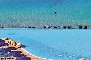 COLONNA GRAND HOTEL CAPO TESTA, a Colonna Luxury Beach Hotel, Santa Te