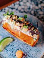 Chromatics Hotel & Restaurant The Hill Club by happyculture