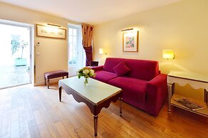 Hôtel Suites Unic Renoir Saint Germain