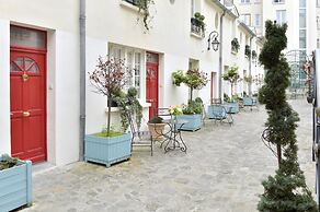 Hôtel Suites Unic Renoir Saint Germain