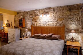 Stone Mill Hotel & Suites