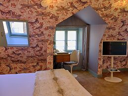 Hôtel du Petit Moulin, Haute Couture hotel by Lacroix