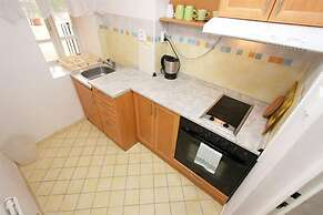 At the Golden Plough Apartments