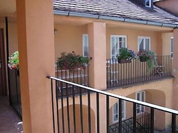 At the Golden Plough Apartments