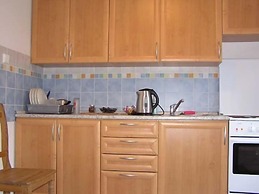 At the Golden Plough Apartments