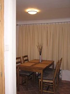 At the Golden Plough Apartments