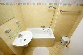 At the Golden Plough Apartments