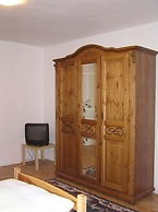 At the Golden Plough Apartments