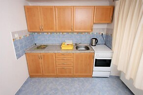 At the Golden Plough Apartments