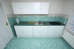 At the Golden Plough Apartments