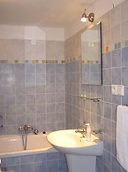 At the Golden Plough Apartments