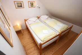 At the Golden Plough Apartments