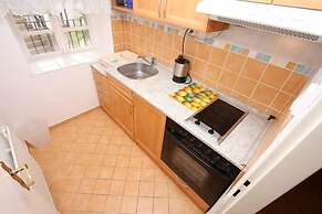 At the Golden Plough Apartments