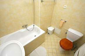 At the Golden Plough Apartments