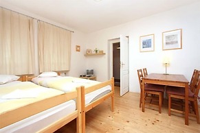 At the Golden Plough Apartments