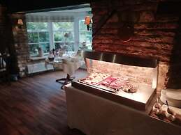 Corinium Hotel & Restaurant