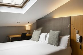 Petit Palace Tres Cruces