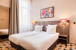 Alma Grand Place Hotel