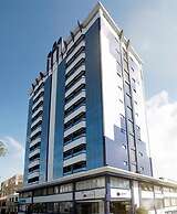 Astron Suítes São José dos Pinhais by Nobile