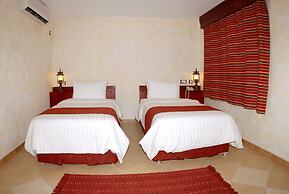 Al Liwan Suites