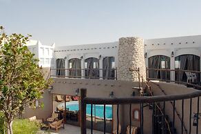 Al Liwan Suites