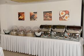 Les Palmiers Beach Hotel