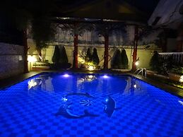 The Executive Villa Inn & Suites