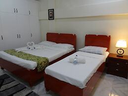 The Executive Villa Inn & Suites