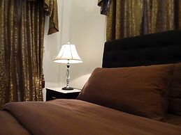 The Executive Villa Inn & Suites