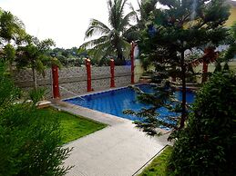 The Executive Villa Inn & Suites