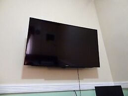 The Executive Villa Inn & Suites