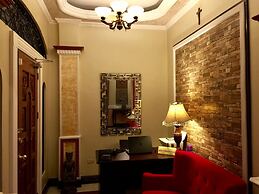 The Executive Villa Inn & Suites