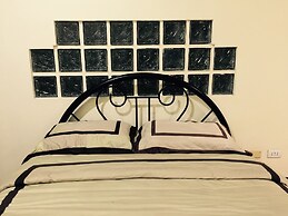 The Executive Villa Inn & Suites