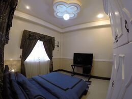 The Executive Villa Inn & Suites