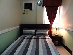 The Executive Villa Inn & Suites