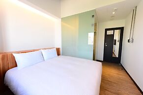 Traveller Inn Tiehua Hotel