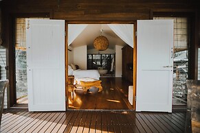 The Boathouses at Leaves & Fishes