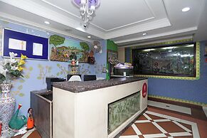 Capital O 6077 Hotel Ashraya