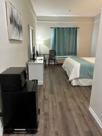 Deluxe 6 Inn & Suites