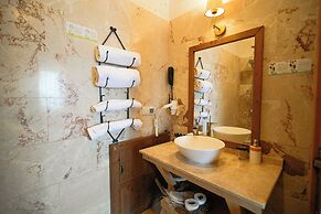 Helike Cave Suites