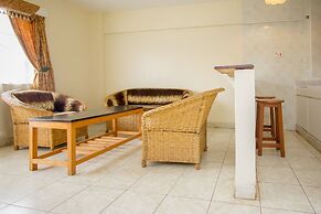 Harlequin Suites Hotel