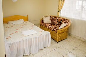 Harlequin Suites Hotel