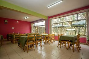 Harlequin Suites Hotel